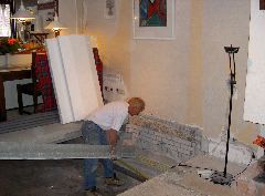Aanbrengen betonbalken kamer